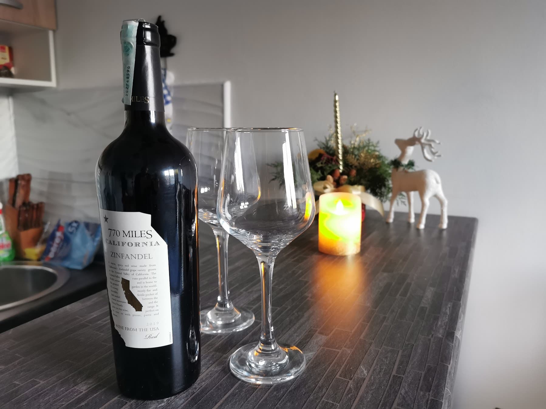 Wine and glasses on the kitchen bar counter